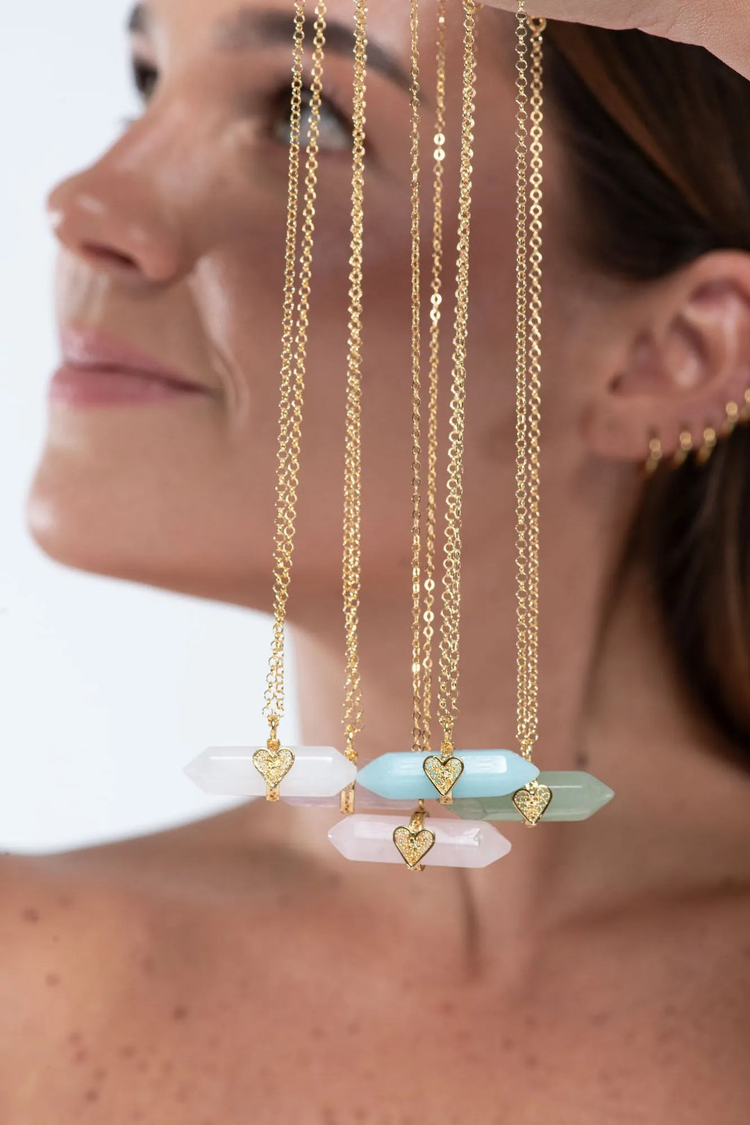 Holding Crystal Necklace