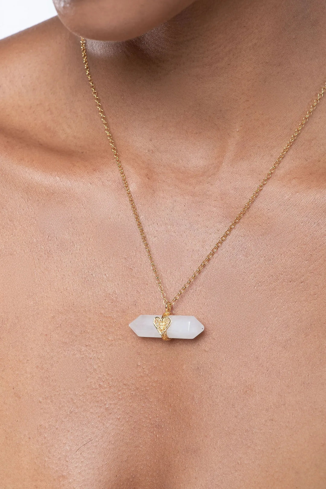 Holding Crystal Necklace