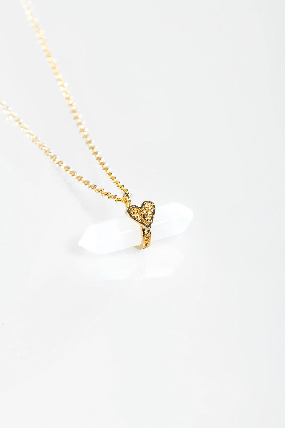 Holding Crystal Necklace