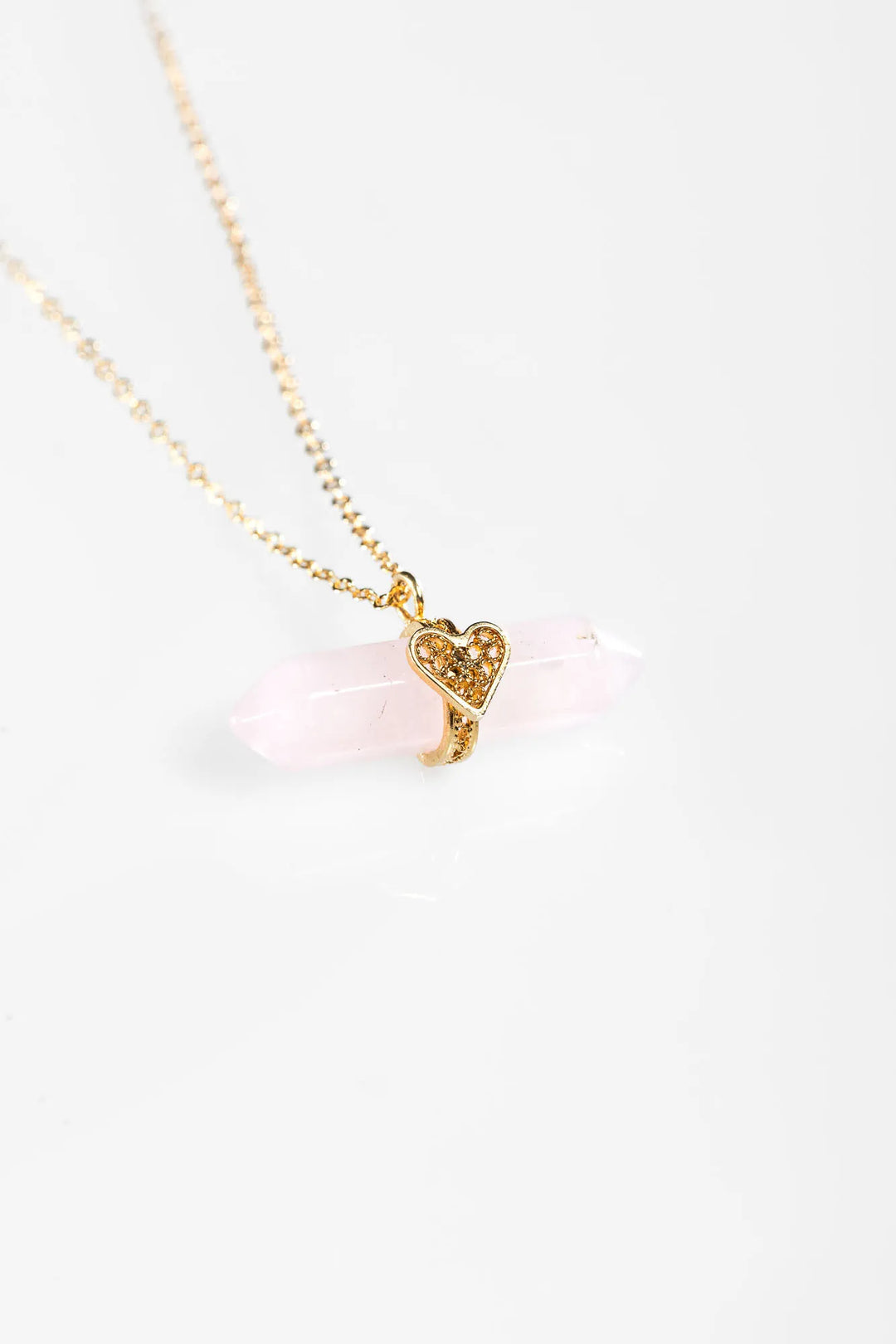 Holding Crystal Necklace