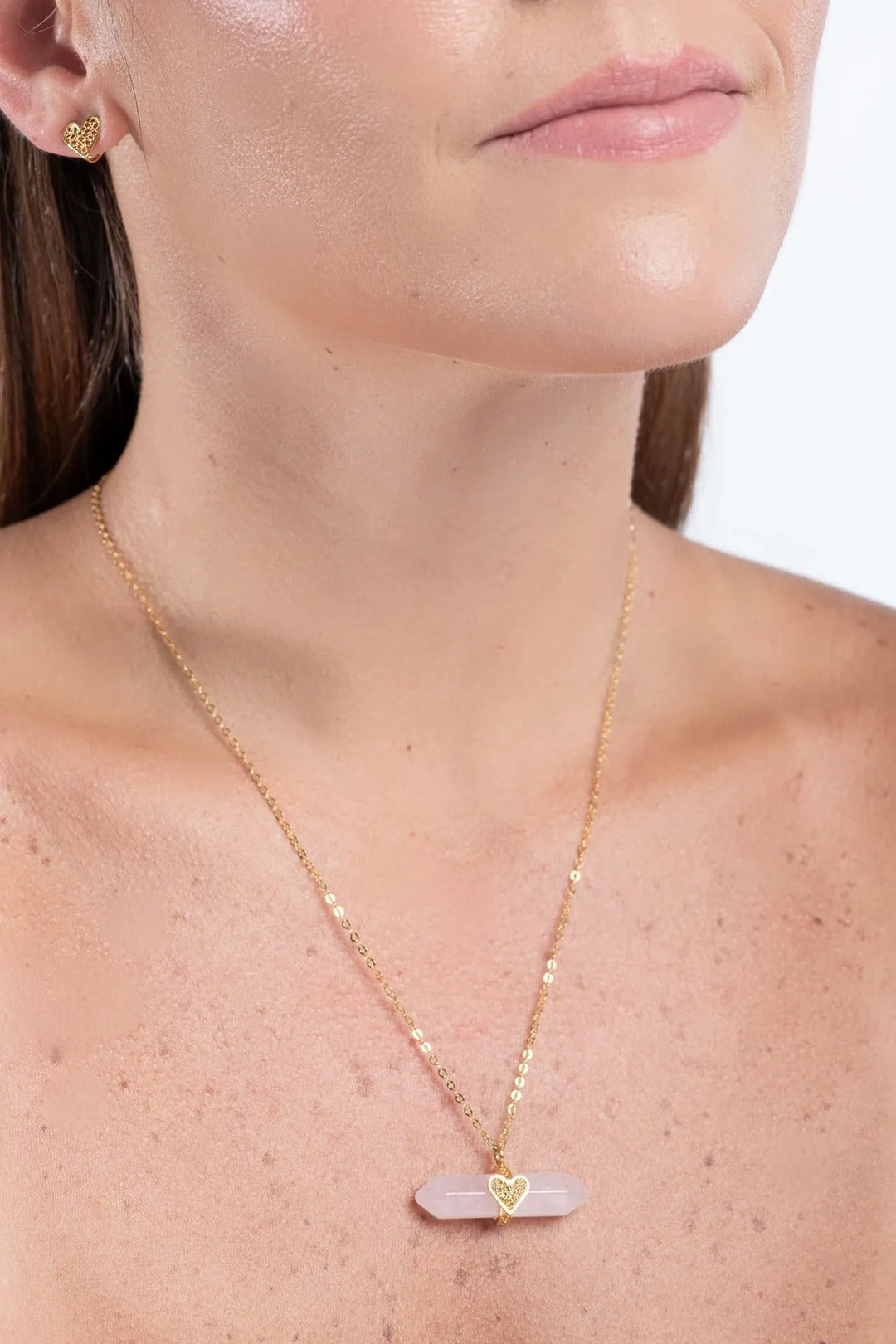 Holding Crystal Necklace