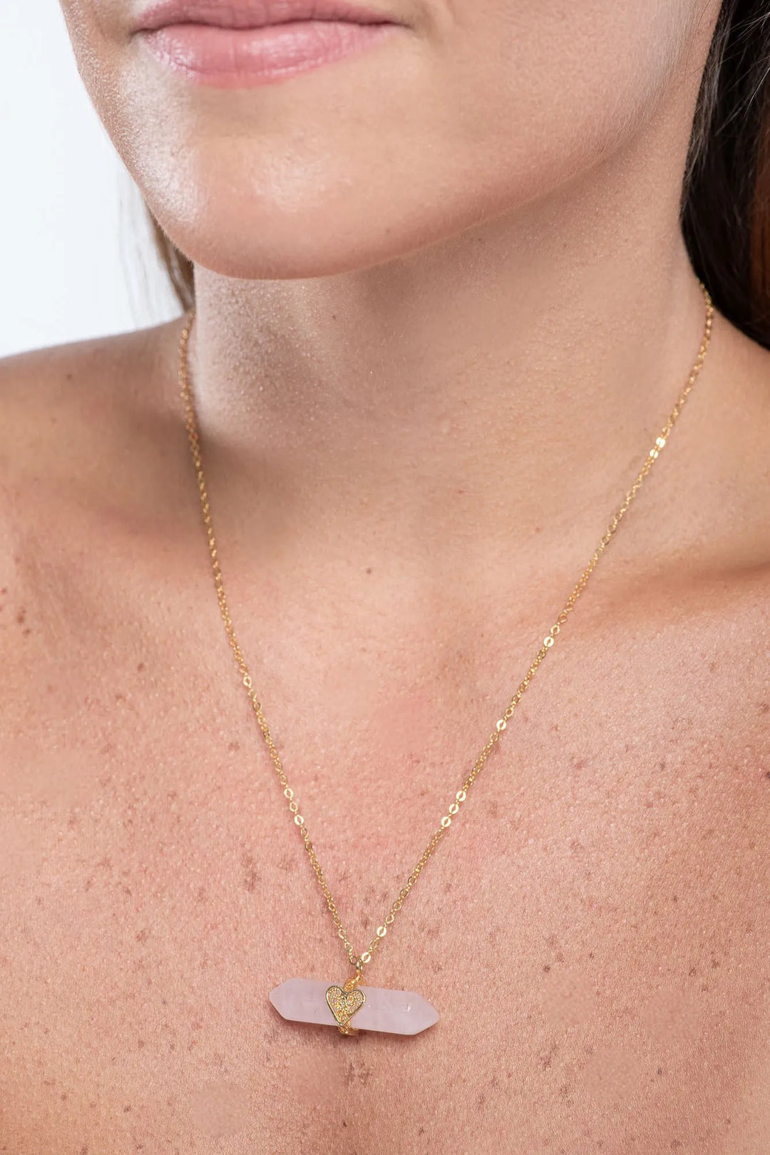 Holding Crystal Necklace