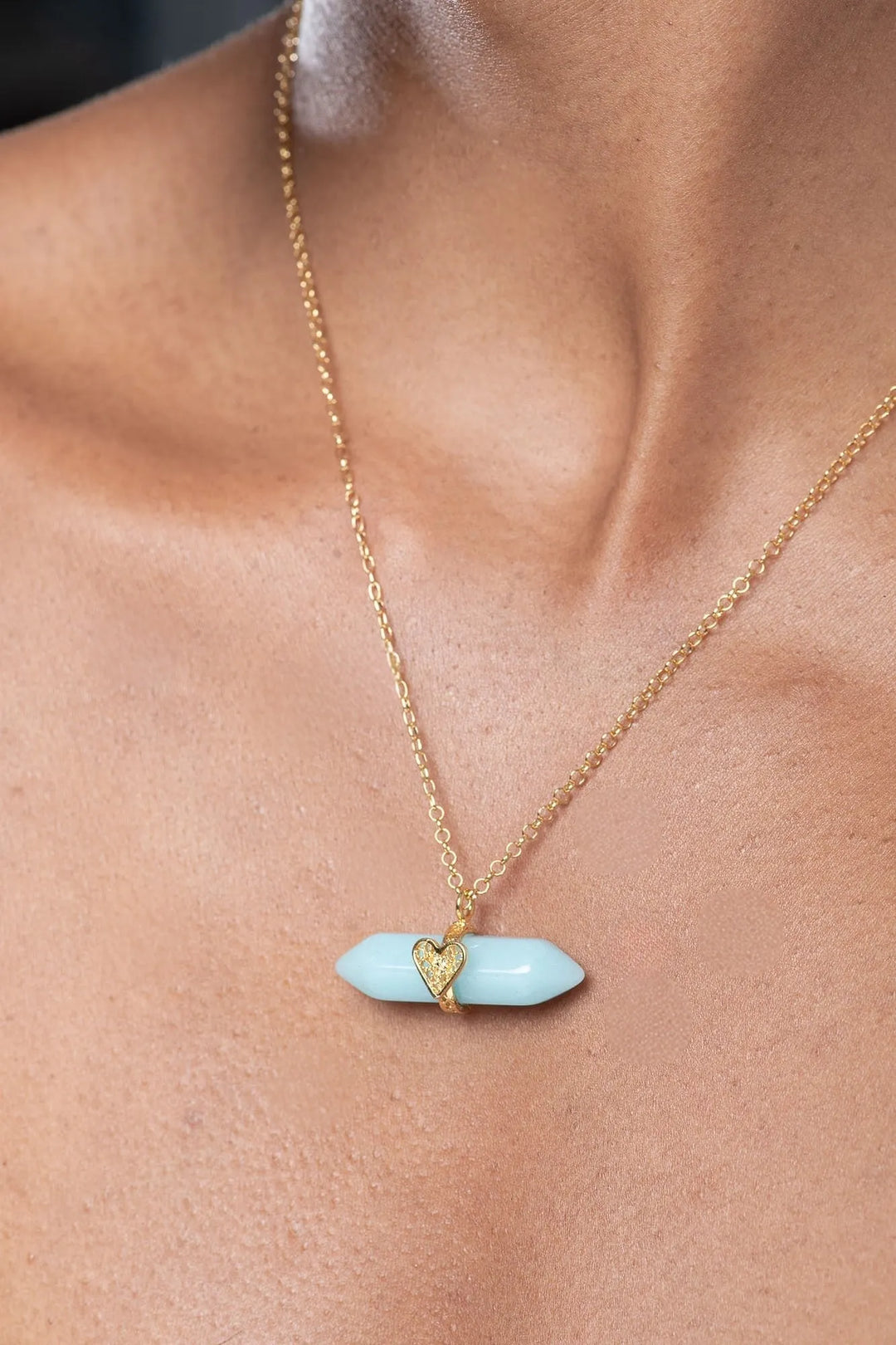 Holding Crystal Necklace